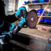 Makita GA038GT206 Akku-Winkelschleifer 40V max. / 2x 5,0 Ah Akku + Schnellladegerät im Transportkoffer + Side-Kick